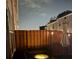 Backyard at night features an outdoor fire pit, providing warmth and ambiance at 5008 Whiteoak Pointe Se # 15, Smyrna, GA 30080