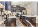Bright kitchen with stainless appliances, island, and subway tile backsplash at 5008 Whiteoak Pointe Se # 15, Smyrna, GA 30080