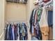 A walk-in closet with rods and shelving offering ample storage at 5008 Whiteoak Pointe Se # 15, Smyrna, GA 30080