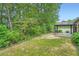 Manicured backyard featuring large gazebo with landscaping surround at 1873 Jameson Cir, Lawrenceville, GA 30043