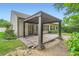 Backyard patio features a large gazebo with landscaping surround at 1873 Jameson Cir, Lawrenceville, GA 30043