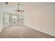Spacious bedroom features three large windows for lots of natural light at 1873 Jameson Cir, Lawrenceville, GA 30043