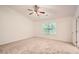 Bedroom features neutral carpet, vaulted ceilings, ceiling fan and window at 1873 Jameson Cir, Lawrenceville, GA 30043