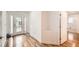 Inviting foyer with decorative glass door and hardwood flooring at 1873 Jameson Cir, Lawrenceville, GA 30043