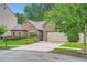 Charming brick home featuring a well-manicured lawn and a two-car garage at 1873 Jameson Cir, Lawrenceville, GA 30043