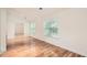 Living room with wood flooring and lots of natural light from windows at 1873 Jameson Cir, Lawrenceville, GA 30043