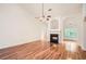 Inviting living room with hardwood floors, arched doorways and fireplace at 1873 Jameson Cir, Lawrenceville, GA 30043
