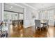 Formal dining room with hardwood floors, stylish lighting, and sophisticated decor at 2362 Saint Davids Nw Sq, Kennesaw, GA 30152