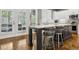 Eat-in kitchen with granite countertops and stainless steel appliances, plus access to the backyard at 2362 Saint Davids Nw Sq, Kennesaw, GA 30152