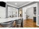 Kitchen featuring island with bar stools and is open to other living spaces at 2362 Saint Davids Nw Sq, Kennesaw, GA 30152