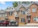 Attractive brick townhome exterior with detailed trim and parking at 2372 Johnson Rd, Atlanta, GA 30345