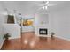 Inviting living room with a cozy fireplace and gleaming hardwood floors at 2372 Johnson Rd, Atlanta, GA 30345