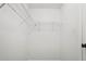 Empty walk-in closet with white walls and built-in shelving at 2372 Johnson Rd, Atlanta, GA 30345