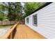 Beautiful wood deck with black trim, perfect for outdoor relaxation and entertaining at 2736 Joyce Ave, Decatur, GA 30032