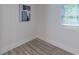 Cozy bedroom featuring minimalist decor, and a sunlit window, creating a peaceful retreat at 2736 Joyce Ave, Decatur, GA 30032