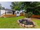 Inviting home exterior featuring a deck and a circular flower bed at 2736 Joyce Ave, Decatur, GA 30032