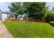 Charming home exterior with well-manicured lawn and lovely landscaping at 2736 Joyce Ave, Decatur, GA 30032
