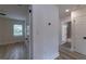 Hallway with doors leading to bathroom and bedrooms at 2736 Joyce Ave, Decatur, GA 30032