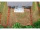 Large backyard enclosed by a wooden fence providing a secure and private outdoor space for activities and relaxation at 607 Little Shoals Ct, Canton, GA 30115