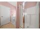 Bathroom showcasing a modern glass-enclosed shower and a walk-in tub for relaxation at 607 Little Shoals Ct, Canton, GA 30115