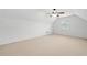 Bright bonus room with neutral carpet, and natural light. A blank canvas ready for your dream rec room or home theater at 607 Little Shoals Ct, Canton, GA 30115