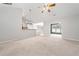 Open living room with access to the kitchen and dining areas at 607 Little Shoals Ct, Canton, GA 30115