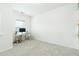 Spacious bedroom with neutral carpet, large window, and bright, neutral walls at , Dallas, GA 30157