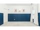 Bedroom with navy blue wainscotting and plush carpet at , Dallas, GA 30157