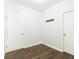 Entryway featuring hardwood floors, coat hooks, and two doors at , Dallas, GA 30157
