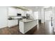 Bright kitchen with stainless steel appliances, white cabinets, and a spacious island at , Dallas, GA 30157