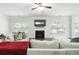 Cozy living room featuring a fireplace, large sofa, and a flat screen television at , Dallas, GA 30157