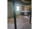 Unfinished basement with concrete floor and a window at 204 Melanie Ln, Woodstock, GA 30188