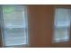 Bedroom showcasing two windows that let in ample natural light at 204 Melanie Ln, Woodstock, GA 30188