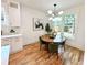 Cozy dining nook with a round table, modern lighting fixture, and an airy, bright ambiance at 224 Cambridge Ave, Decatur, GA 30030