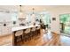 Bright and spacious kitchen with a large island, modern white cabinetry, and stainless steel appliances at 224 Cambridge Ave, Decatur, GA 30030