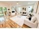 Open living room features hardwood floors, a modern fireplace, and abundant natural light at 224 Cambridge Ave, Decatur, GA 30030
