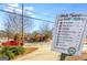 Guidepost showing walking times from the OakHurst Business District to local destinations at 224 Cambridge Ave, Decatur, GA 30030