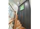 Stairway features a black accent wall and natural light at 224 Cambridge Ave, Decatur, GA 30030