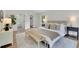 Bright main bedroom featuring a walk-in closet, ensuite bathroom, and new floors at 3512 Hidden Acres Dr, Atlanta, GA 30340