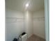 Walk-in closet has ample storage space with shelving and room for organizing items at 7695 Baron Rd, Fairburn, GA 30213