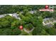 Overhead view of properties nestled among lush greenery near Stone Mountain at 842 Third St, Stone Mountain, GA 30083