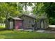 Backyard patio featuring a hammock and lush landscaping at 842 Third St, Stone Mountain, GA 30083