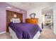 Calming bedroom with a full bed, accent wall, and adjoining sitting area at 842 Third St, Stone Mountain, GA 30083