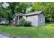 Charming single-story home with well-maintained front lawn and landscaping at 842 Third St, Stone Mountain, GA 30083