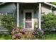 Charming front door with hydrangeas, inviting entry and freshly painted exterior at 842 Third St, Stone Mountain, GA 30083