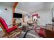 Cozy living room featuring a stone fireplace and inviting decor at 842 Third St, Stone Mountain, GA 30083