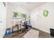 Bright room featuring a door to the outside, a window, and wood floors at 842 Third St, Stone Mountain, GA 30083