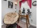 Comfortable sitting area featuring a chair, table, and serene decorations at 842 Third St, Stone Mountain, GA 30083