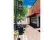 Charming street view of Stone Mountain Village with brick sidewalks and storefronts at 842 Third St, Stone Mountain, GA 30083