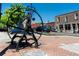 View of a historic town square featuring a large bell and brick-paved streets at 842 Third St, Stone Mountain, GA 30083